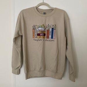 Taylor Swift’s book Version sweatshirt
